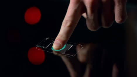 Closeup-digital-finger-biometric-sensor-verifying-user-granting-access-to-system